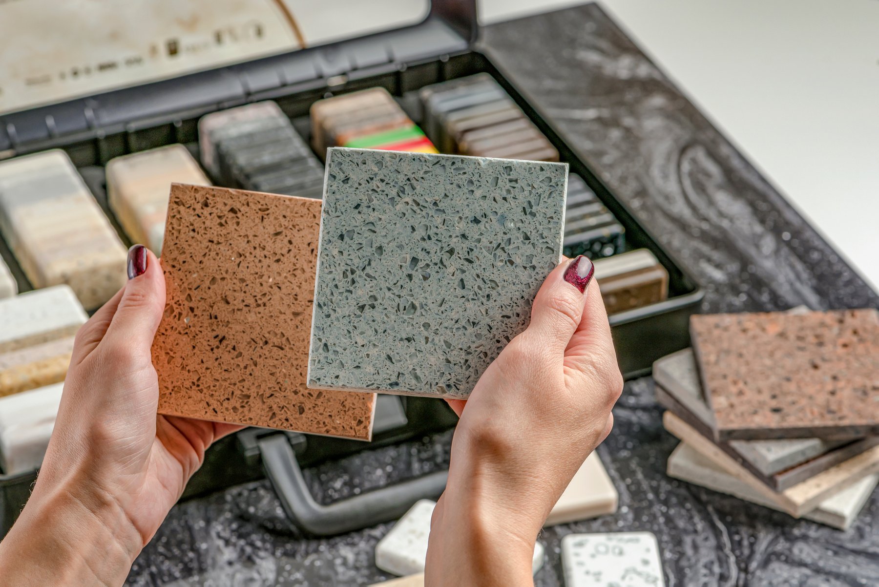 Person Choosing Samples for Countertop Material